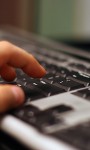 stockvault-hand-on-keyboard113050